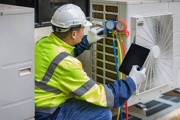 Professional Heat Pump Repair technician working in Big Lake, TX